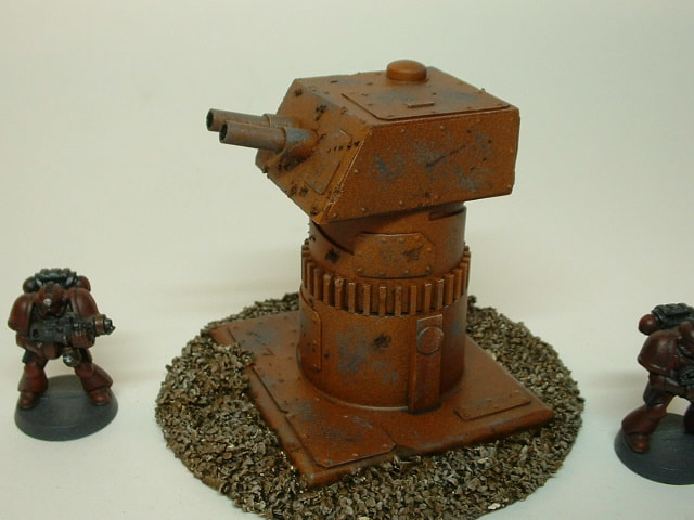 Rusted defensive turret standing on a desolate battlefield - UniversalTerrain.com