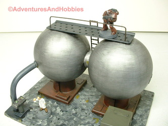 Double spherical storage tanks with walkway closeup view - UniversalTerrain.com