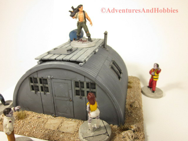 Survivor's remote hideout made from old metal hut with wooden platform on top - UniversalTerrain.com