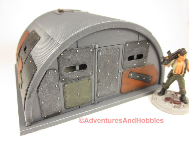 Armored quonset hut T613 reinforced with metal plates for 25-28mm scale post apocalyptic wargame scenery.